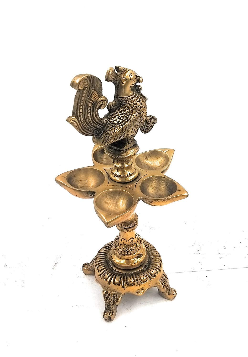 Brass Peacock Diya with Four Lamps on Stand in Gold Color Color: An exquisite diya featuring four lamps in a peacock - SvarupArt
