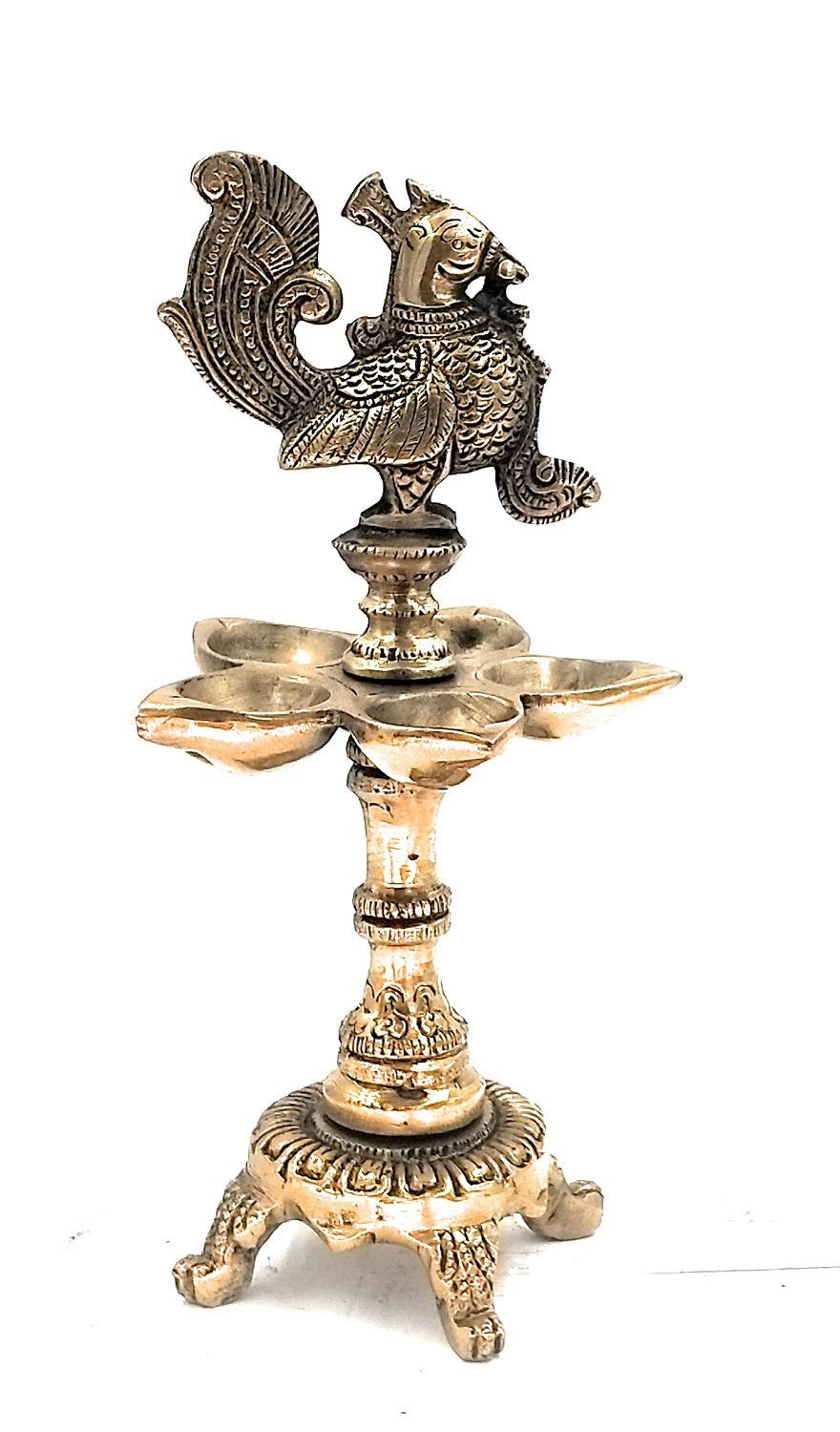Brass Peacock Diya with Four Lamps on Stand in Gold Color Color: An exquisite diya featuring four lamps in a peacock - SvarupArt