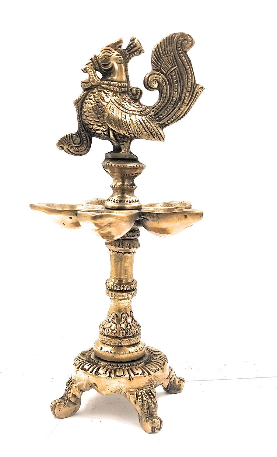 Brass Peacock Diya with Four Lamps on Stand in Gold Color Color: An exquisite diya featuring four lamps in a peacock - SvarupArt