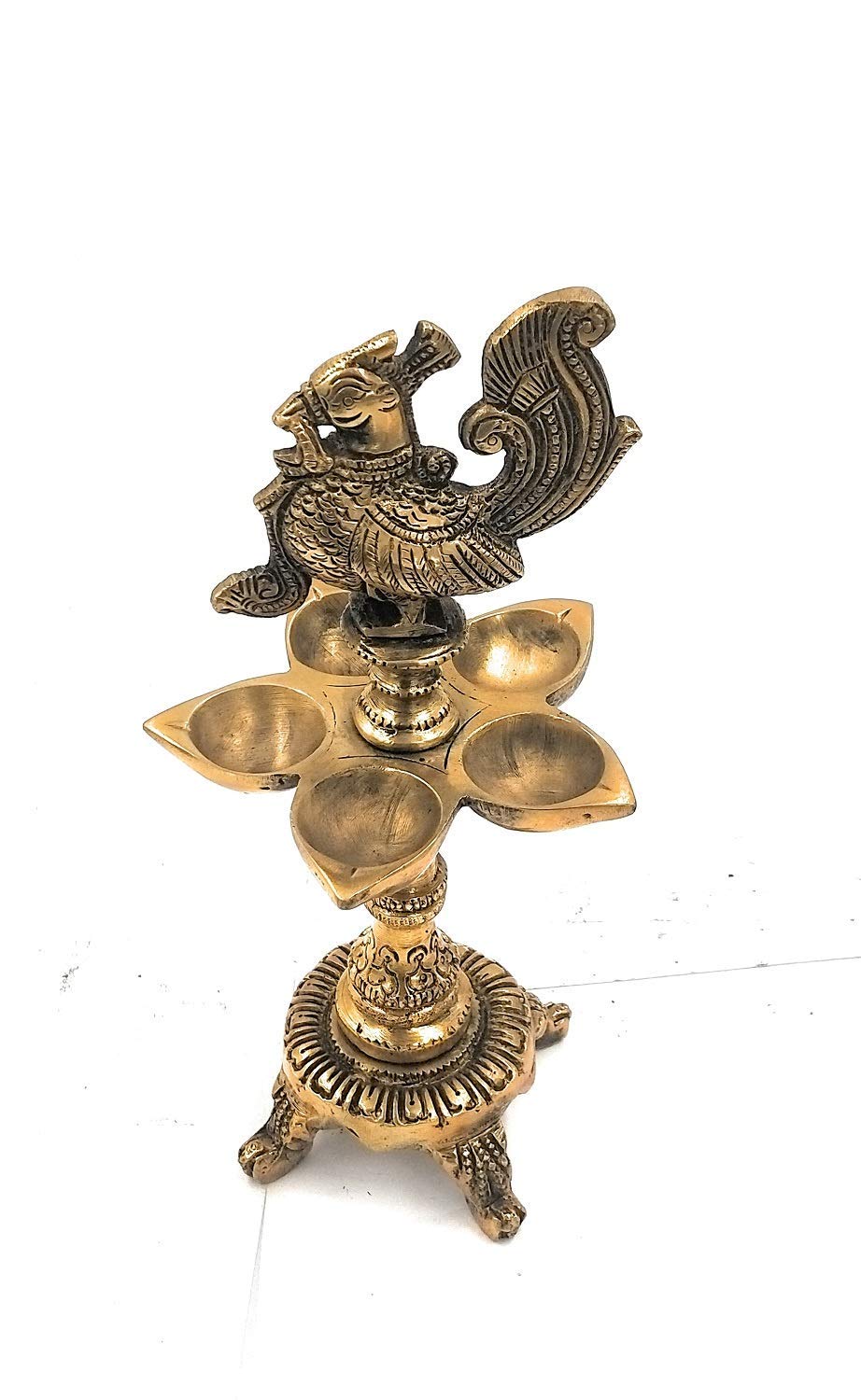 Brass Peacock Diya with Four Lamps on Stand in Gold Color Color: An exquisite diya featuring four lamps in a peacock - SvarupArt