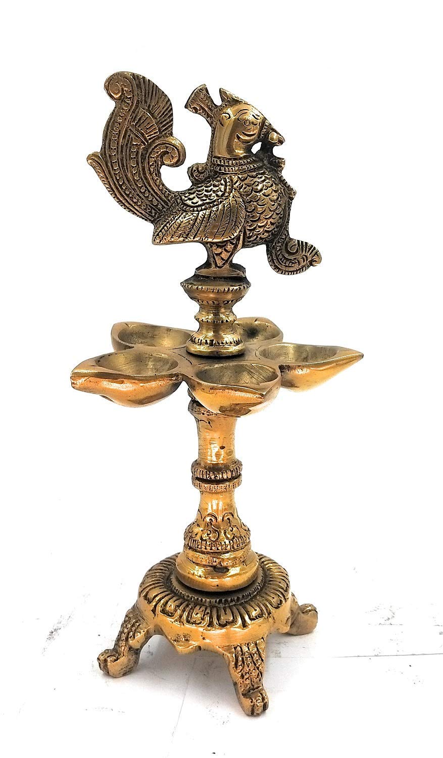 Brass Peacock Diya with Four Lamps on Stand in Gold Color Color: An exquisite diya featuring four lamps in a peacock - SvarupArt